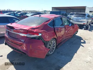 2017 Ford Fusion Titanium with VIN 3FA6P0K90HR184777, listed as a IAAI auction lot 41722188 with 116,654 mi miles. Bid and sale history available at carsss.com. Image 4.
