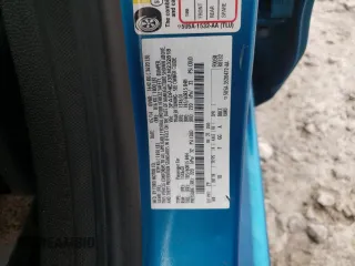 2014 Ford Fiesta SE z VIN 3FADP4EJ3EM232818, wystawiony jako Copart lot #42742745 z przebiegiem 122 987 mil mil oraz Szkoda całkowita • Salvage title. Historia ofert i sprzedaży dostępna na DreamBid. Obrazek 12.