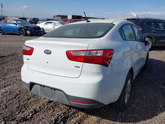 2012 Kia Rio LX with VIN KNADM4A30C6077391, listed as a IAAI auction lot 38907618 with 192,180 mi miles. Bid and sale history available at carsss.com. Image 4.