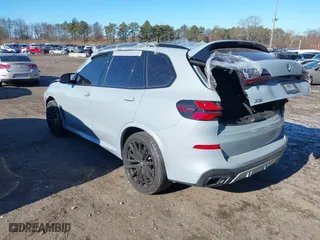 2025 BMW X5 M60i with VIN 5UX33EU08S9X68091, listed as a IAAI auction lot 41246321 with 10 mi miles. Bid and sale history available at carsss.com. Image 3.