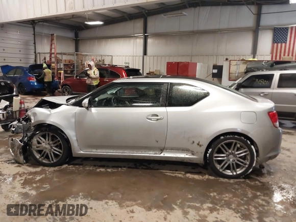 2011 Scion tC z VIN JTKJF5C76B3006789, wystawiony jako IAAI lot #41571706 z przebiegiem 92 169 mil mil oraz . Historia ofert i sprzedaży dostępna na DreamBid. Obrazek 14.