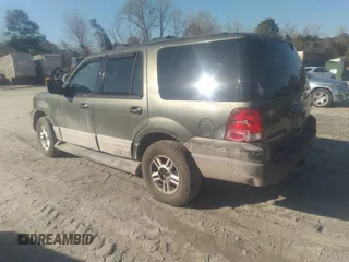 2004 Ford Expedition XLT with VIN 1FMPU16W64LA01397, listed as a IAAI auction lot 41494738 with 214,192 mi miles. Bid and sale history available at carsss.com. Image 3.