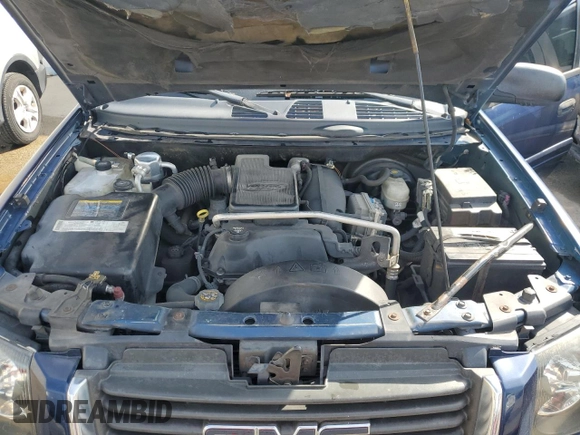 2004 GMC Envoy SLE with VIN 1GKDS13S842402250, listed as a Copart auction lot 54941005 with 163,380 mi miles and Salvage Title. Bid and sale history available at DreamBid. Image 12.