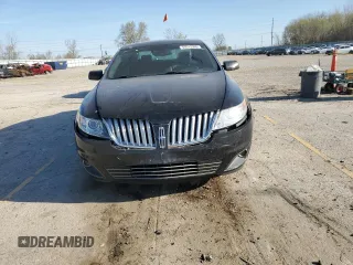 2011 Lincoln MKS z VIN 1LNHL9DR1BG607036, wystawiony jako Copart lot #53512305 z przebiegiem 159 921 mil mil oraz Szkoda całkowita • Salvage title. Historia ofert i sprzedaży dostępna na DreamBid. Obrazek 5.