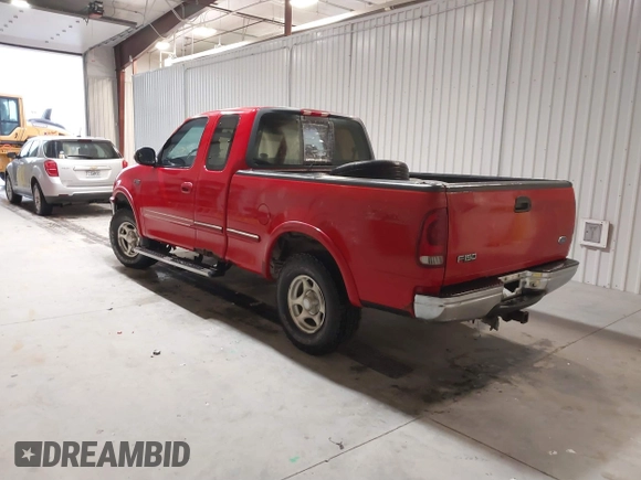 1997 Ford F-150 XL with VIN 1FTEX18L7VKD72386, listed as a IAAI auction lot 41667913 with 168,813 mi miles. Bid and sale history available at carsss.com. Image 3.