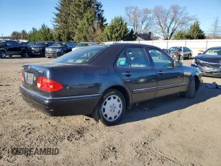 1996 Mercedes-Benz E Class with VIN WDBJF20F5TJ021801, listed as a Copart auction lot 80188074 with 196,397 mi miles and Salvage Title. Bid and sale history available at carsss.com. Image 3.