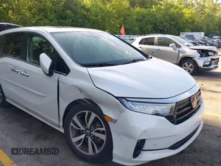 2022 Honda Odyssey Touring with VIN 5FNRL6H88NB026592, listed as a IAAI auction lot 42367048 with 57,066 mi miles and . Bid and sale history available at DreamBid. Image 6.