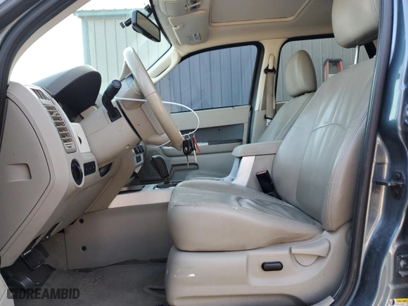 2010 Mercury Mariner Premier with VIN 4M2CN9H76AKJ30904, listed as a Copart auction lot 43912265 with 167,352 mi miles and Salvage Title. Bid and sale history available at carsss.com. Image 7.