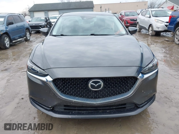 2020 Mazda 6 Grand Touring with VIN JM1GL1TYXL1524543, listed as a IAAI auction lot 41474337 with 52,160 mi miles and . Bid and sale history available at DreamBid. Image 13.
