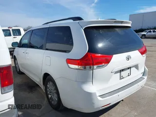 2011 Toyota Sienna XLE AAS with VIN 5TDYK3DCXBS043733, listed as a IAAI auction lot 41601544 with 221,658 mi miles and . Bid and sale history available at DreamBid. Image 14.