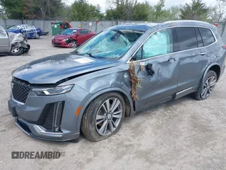 2020 Cadillac XT6 FWD Premium Luxury z VIN 1GYKPCRS9LZ129763, wystawiony jako IAAI lot #42052532 z przebiegiem 57 670 mil mil oraz . Historia ofert i sprzedaży dostępna na DreamBid. Obrazek 16.