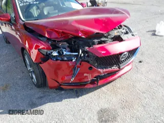 2018 Mazda 6 Grand Touring with VIN JM1GL1TY1J1302146, listed as a IAAI auction lot 41788881 with 55,852 mi miles and . Bid and sale history available at DreamBid. Image 6.