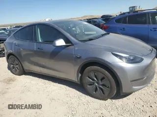 2024 Tesla Model Y Long Range with VIN 7SAYGDEE6RA321064, listed as a Copart auction lot 58889795 with 48,857 mi miles and Salvage title. Bid and sale history available at DreamBid. Image 4.