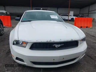 2011 Ford Mustang V6 with VIN 1ZVBP8AM9B5166461, listed as a IAAI auction lot 41997889 with 186,366 mi miles and . Bid and sale history available at carsss.com. Image 6.