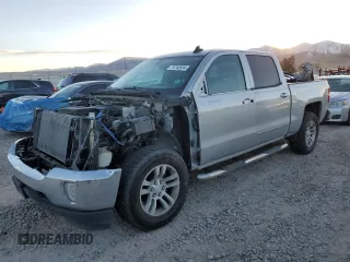 2017 Chevrolet Silverado 1500 LT with VIN 3GCUKREC4HG194512, listed as a Copart auction lot 79748534 with 183,804 mi miles and Salvage Title. Bid and sale history available at DreamBid. Image 1.