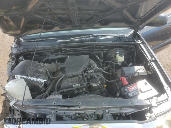 2011 Toyota Tacoma z VIN 5TFTX4GN1BX004490, wystawiony jako Copart lot #59059015 z przebiegiem 171 268 mil mil oraz Szkoda całkowita • Salvage title. Historia ofert i sprzedaży dostępna na DreamBid. Obrazek 11.