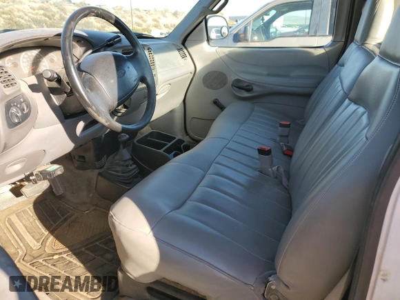 1998 Ford F-150 with VIN 1FTZF1821WKB21778, listed as a Copart auction lot 73009444 with 220,898 mi miles and Salvage title. Bid and sale history available at DreamBid. Image 7.