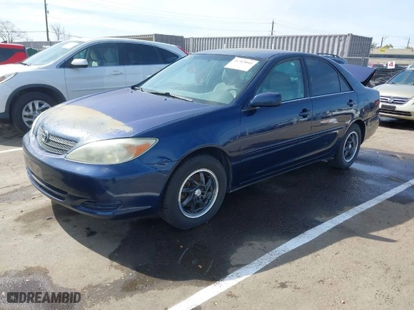 2004 Toyota Camry LE with VIN 4T1BE32K84U381293, listed as a IAAI auction lot 41765044 with 228,746 mi miles. Bid and sale history available at carsss.com. Image 2.