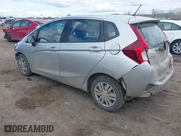 2015 Honda Fit LX with VIN 3HGGK5H57FM784299, listed as a IAAI auction lot 41863989 with 169,657 mi miles. Bid and sale history available at carsss.com. Image 3.