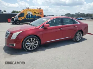 2014 Cadillac XTS Luxury z VIN 2G61M5S39E9244291, wystawiony jako Copart lot #57609875 z przebiegiem 114 769 mil mil oraz Nie do naprawy. Historia ofert i sprzedaży dostępna na DreamBid. Obrazek 1.