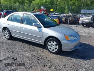 2001 Honda Civic EX with VIN 2HGES26701H506314, listed as a IAAI auction lot 42153550 with 326,151 mi miles. Bid and sale history available at carsss.com. Image 1.