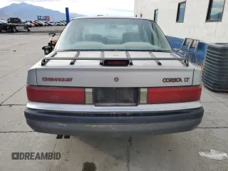 1990 Chevrolet Corsica z VIN 1G1LT54T5LY175073, wystawiony jako Copart lot #71889604 z przebiegiem 111 578 mil mil oraz Tytuł czysty. Historia ofert i sprzedaży dostępna na DreamBid. Obrazek 6.