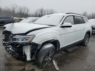 2021 Volkswagen Atlas SE z VIN 1V2LP2CA1MC597090, wystawiony jako Copart lot #85986184 z przebiegiem 27 520 mil mil oraz Szkody całkowita. Historia ofert i sprzedaży dostępna na DreamBid. Obrazek 1.