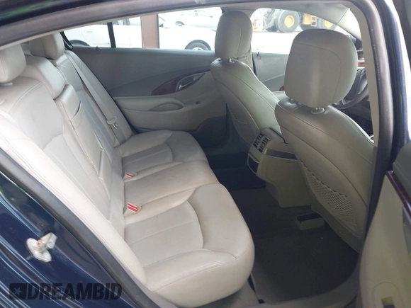 2012 Buick LaCrosse Premium 1 z VIN 1G4GD5E32CF256432, wystawiony jako IAAI lot #42452651 z przebiegiem 107 899 mil mil oraz . Historia ofert i sprzedaży dostępna na DreamBid. Obrazek 8.