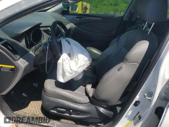 2012 Hyundai Sonata Hybrid with VIN KMHEC4A48CA054212, listed as a Copart auction lot 56938545 with Not provided miles and Salvage title. Bid and sale history available at DreamBid. Image 7.
