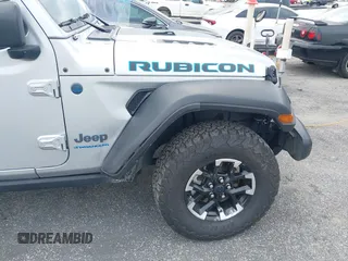 2024 Jeep Wrangler Rubicon with VIN 1C4RJXR61RW224506, listed as a IAAI auction lot 42111434 with 33,689 mi miles and . Bid and sale history available at DreamBid. Image 17.
