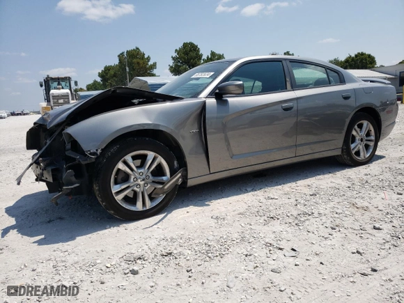 2011 Dodge Charger RT Max with VIN 2B3CM5CT7BH572445, listed as a Copart auction lot 66782634 with 129,743 mi miles and Salvage Title. Bid and sale history available at carsss.com. Image 1.