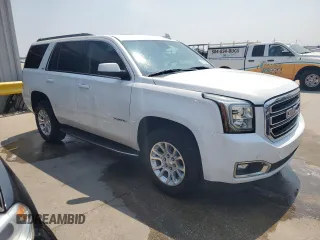 2020 GMC Yukon SLT with VIN 1GKS1BKC0LR243224, listed as a Copart auction lot 65768234 with 129,702 mi miles and Salvage Title. Bid and sale history available at DreamBid. Image 4.