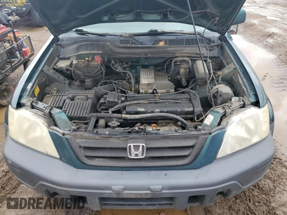 1999 Honda CR-V EX z VIN JHLRD1869XC064785, wystawiony jako Copart lot #58666215 z przebiegiem 241 633 mil mil oraz Czysty tytuł • Clean title. Historia ofert i sprzedaży dostępna na DreamBid. Obrazek 12.