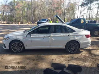 2020 Volkswagen Jetta GLI S with VIN 3VW6T7BUXLM038747, listed as a IAAI auction lot 41937087 with 71,831 mi miles and . Bid and sale history available at DreamBid. Image 14.