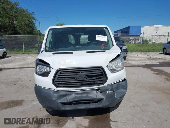 2015 Ford Transit Cargo with VIN 1FTNE1ZM2FKA78621, listed as a IAAI auction lot 41654632 with 234,709 mi miles and . Bid and sale history available at carsss.com. Image 6.
