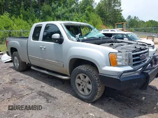 2013 GMC Sierra 1500 SLT z VIN 1GTR2WE77DZ398691, wystawiony jako IAAI lot #42664135 z przebiegiem 218 883 mil mil oraz . Historia ofert i sprzedaży dostępna na DreamBid. Obrazek 1.