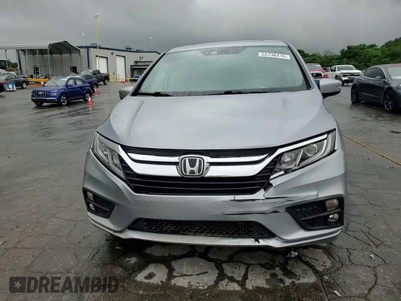 2018 Honda Odyssey EX-L z VIN 5FNRL6H74JB033475, wystawiony jako Copart lot #55736415 z przebiegiem 104 108 mil mil oraz Szkoda całkowita • Salvage title. Historia ofert i sprzedaży dostępna na DreamBid. Obrazek 14.