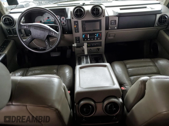 2003 Hummer H2 with VIN 5GRGN23U33H118459, listed as a Copart auction lot 77765694 with 157,390 mi miles and Salvage Title. Bid and sale history available at carsss.com. Image 8.