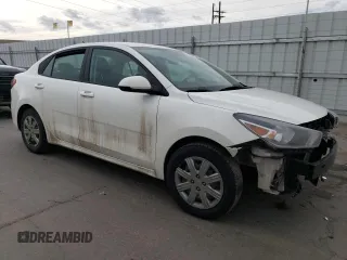2023 Kia Rio LX with VIN 3KPA24AD0PE566085, listed as a Copart auction lot 50354455 with 65,203 mi miles and Salvage Title. Bid and sale history available at DreamBid. Image 4.