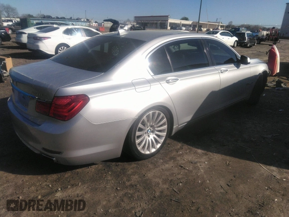 2012 BMW 7 Series 750Li with VIN WBAKB8C56CC962425, listed as a IAAI auction lot 32792385 with 114,092 mi miles and . Bid and sale history available at DreamBid. Image 4.