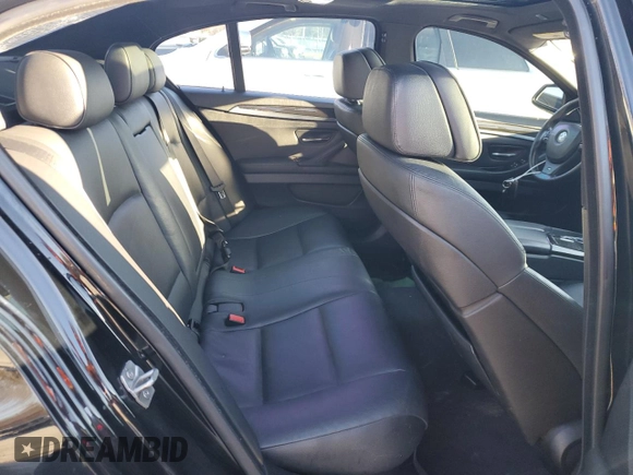 2013 BMW 5 Series 550i with VIN WBAFR9C54DDX79717, listed as a Copart auction lot 84827264 with Not Provided miles and Salvage Title. Bid and sale history available at carsss.com. Image 10.