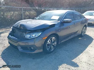 2016 Honda Civic Sedan EX-T with VIN 19XFC1F31GE031879, listed as a IAAI auction lot 41759467 with 156,882 mi miles. Bid and sale history available at carsss.com. Image 21.