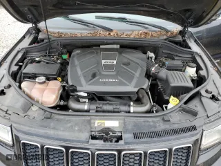 2014 Jeep Grand Cherokee Overland with VIN 1C4RJFCM0EC366987, listed as a Copart auction lot 52766875 with 148,460 mi miles and Clean Title. Bid and sale history available at carsss.com. Image 12.