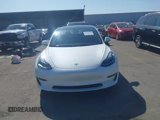 2022 Tesla Model 3 with VIN 5YJ3E1EA2NF245817, listed as a IAAI auction lot 41976493 with 32,710 mi miles and . Bid and sale history available at DreamBid. Image 13.