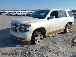 2015 Chevrolet Tahoe LTZ with VIN 1GNSCCKCXFR287609, listed as a IAAI auction lot 41688936 with 112,678 mi miles. Bid and sale history available at carsss.com. Image 18.