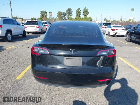 2018 Tesla Model 3 Long Range Battery with VIN 5YJ3E1EA5JF171948, listed as a IAAI auction lot 41993887 with 42,370 mi miles and . Bid and sale history available at DreamBid. Image 15.