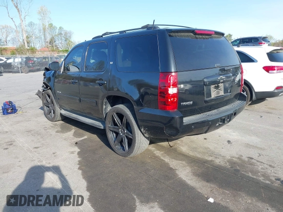 2014 Chevrolet Tahoe LT with VIN 1GNSCBE0XER202150, listed as a IAAI auction lot 41922771 with 168,693 mi miles and . Bid and sale history available at DreamBid. Image 3.