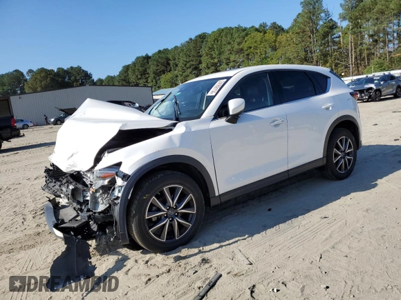 2018 Mazda CX-5 Grand Touring with VIN JM3KFADM9J1439436, listed as a Copart auction lot 74189114 with 0 mi miles and Salvage Title. Bid and sale history available at carsss.com. Image 1.