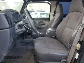 2002 Jeep Wrangler SE with VIN 1J4FA29P82P732805, listed as a Copart auction lot 86017044 with 138,679 mi miles and Salvage Title. Bid and sale history available at DreamBid. Image 7.