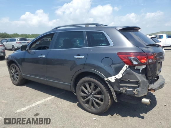 2014 Mazda CX-9 Grand Touring with VIN JM3TB3DV9E0444720, listed as a Copart auction lot 63687855 with 144,568 mi miles and Salvage title. Bid and sale history available at DreamBid. Image 2.